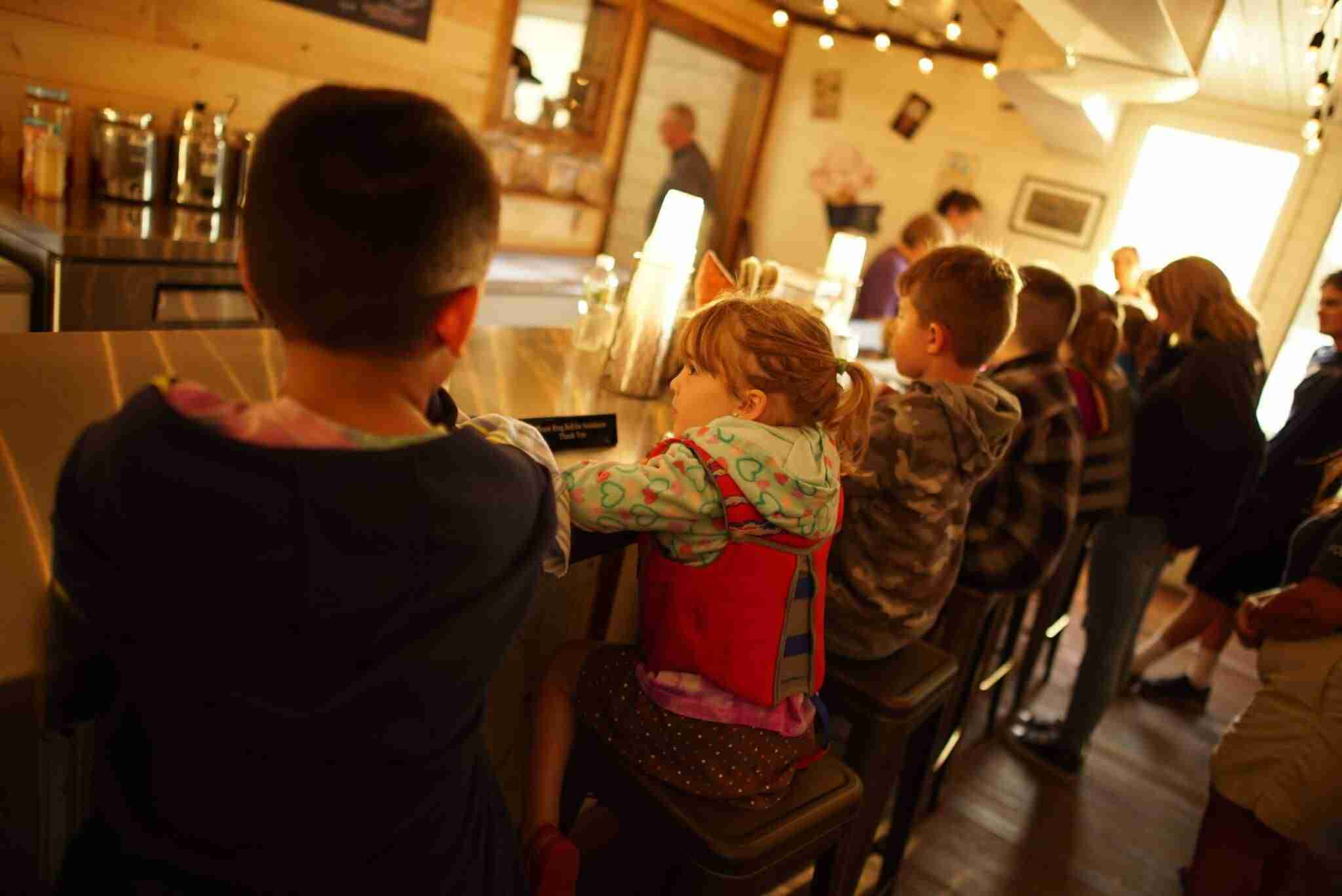 TMF Kids enjoying ice cream at Lakeside Scoops thanks to our friends at Scoops for Troops!