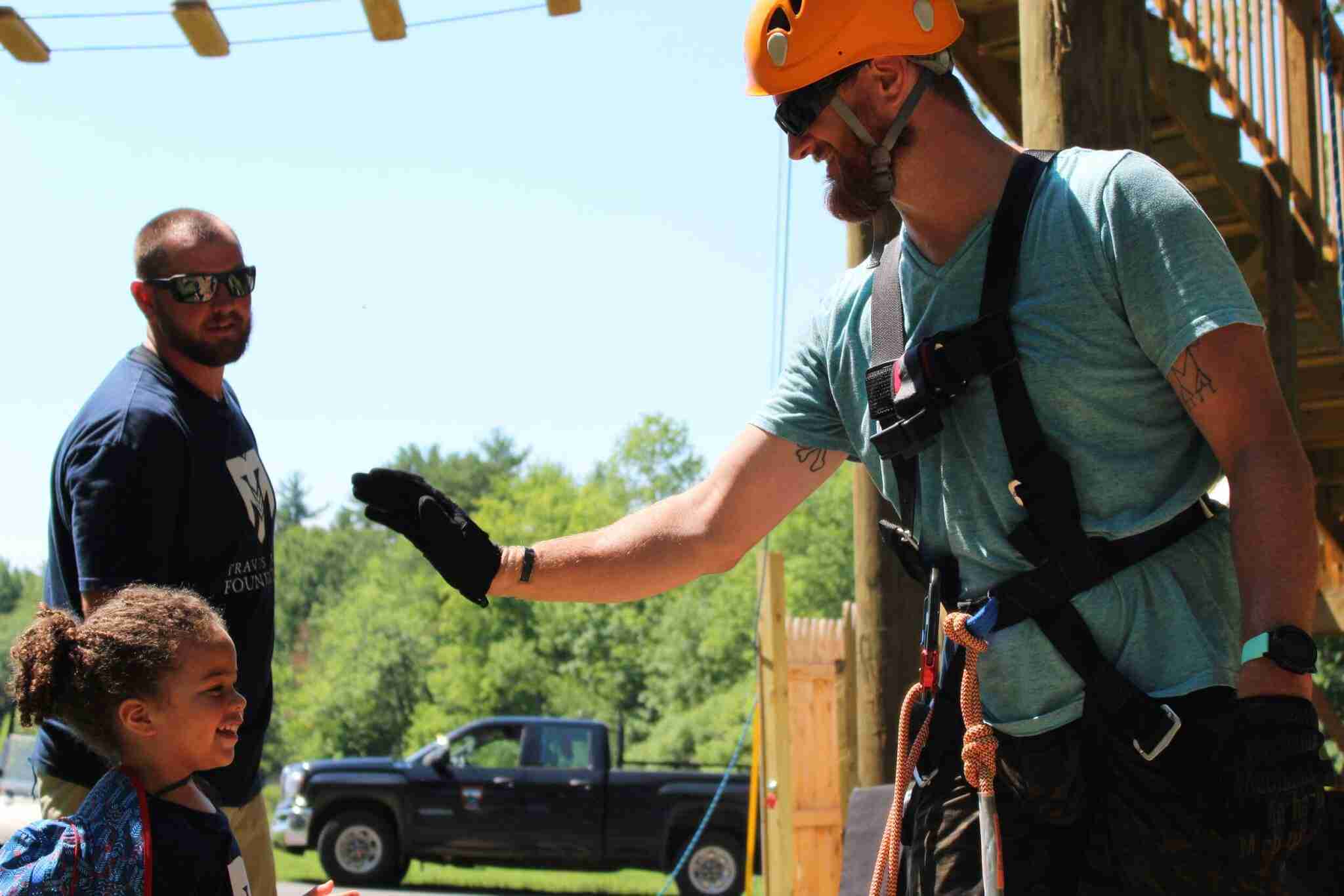 Aubrey and Theron enjoying a moment after completing the ropes course.