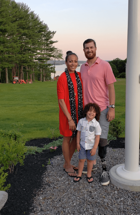 Aubrey, Jasmine, and Theron pose for a photo at the retreat.